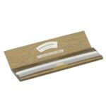 En pakke Smokers Choice Rolling Papers Gold King Size med et tekstureret brunt omslag, synlige papirer, et delvist trukket ud, og mærkeoplysninger vises.
