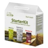 Mineralstarterkit i en grøn plastbeholder med en transparent låg, der har en tætsluttende kant. Beholderen indeholder flere små rum, hver med forskellige mineralske ingredienser, som er pakket i gennemsigtige poser. Teksten på låget angiver indholdet med klare, sorte bogstaver. Farverne spænder fra grønne nuancer til naturlige jordfarver fra mineralerne.
