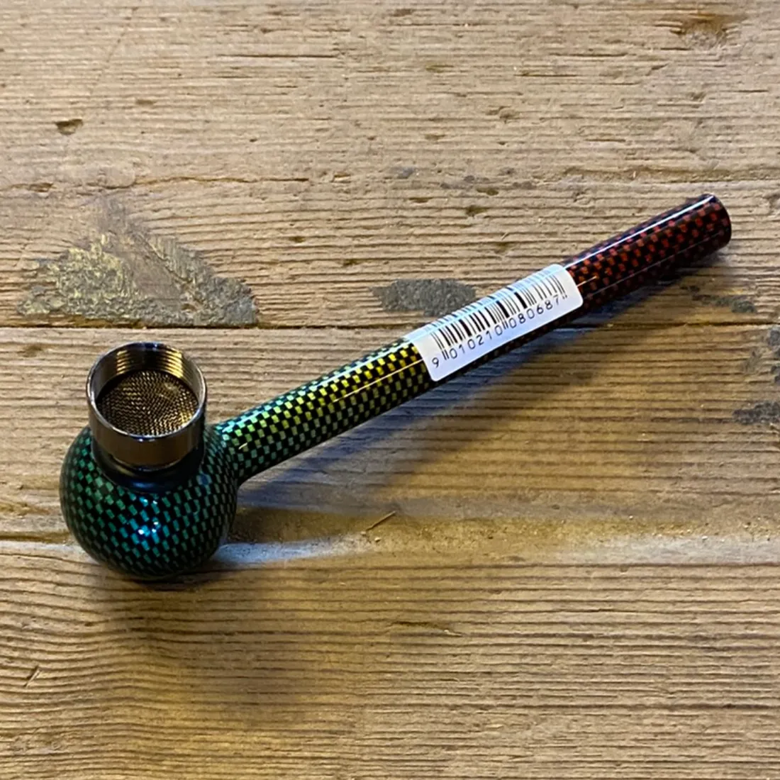 Rund Glas Pibe 40x120mm Rasta med små grønne, gule og røde prikker på sort bund samt hvid etiket omkring røret.