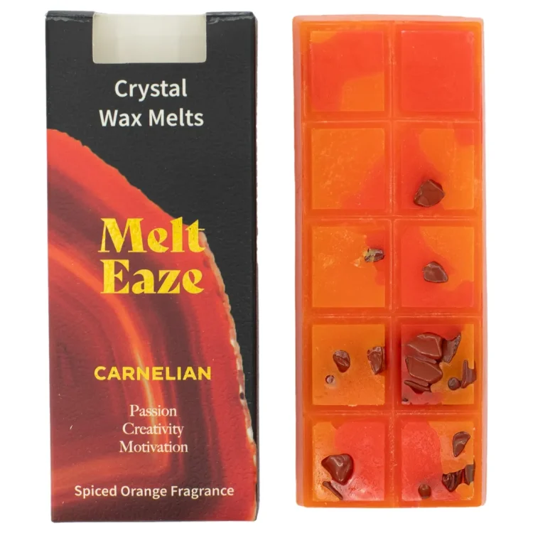Melt Eaze Spiced Orange Duftvoks i orange firkanter med brune stykker. Sort og rød æske med gult "Melt Eaze".
